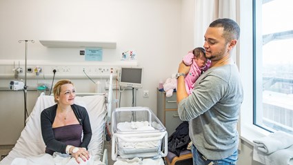 Patients welcoming a new arrival at the Royal London Hospital